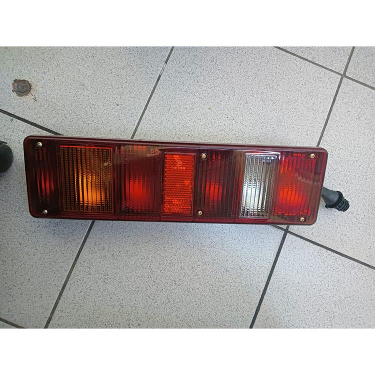 Фонарь задний на Газель Некст с узким поворотником (с лампами 12в) боковой байонетный разъём, левый (Оригинал)